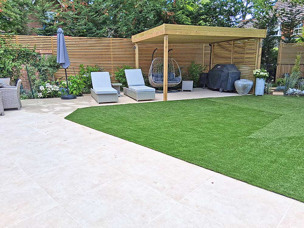 Rear garden featuring new arbour and seating area